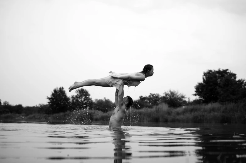 this is a man performing a water sport in the water