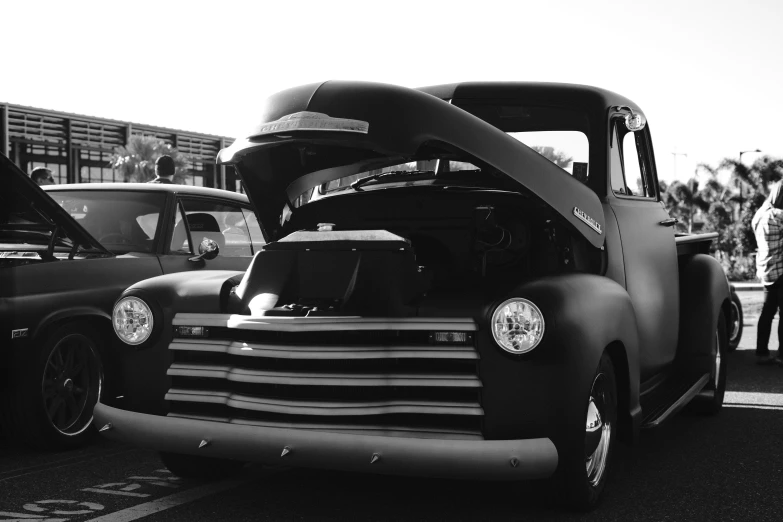 old time black and white pograph of a classic truck