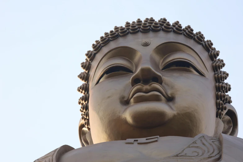 a large statue of the buddha facing upward