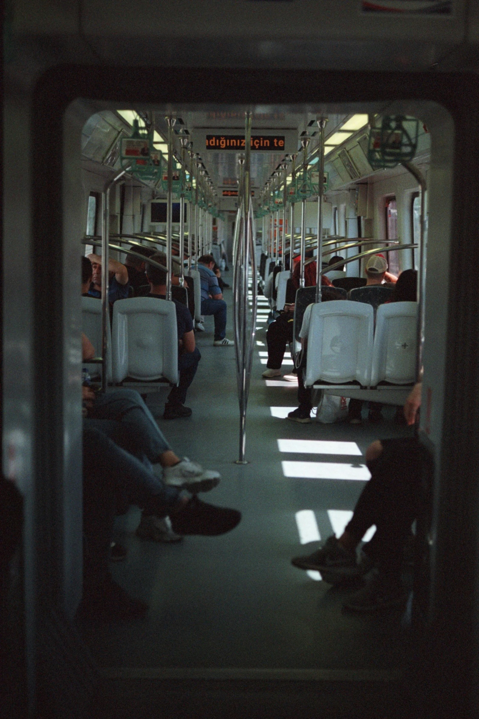 inside a crowded public transportation vehicle with some people on it