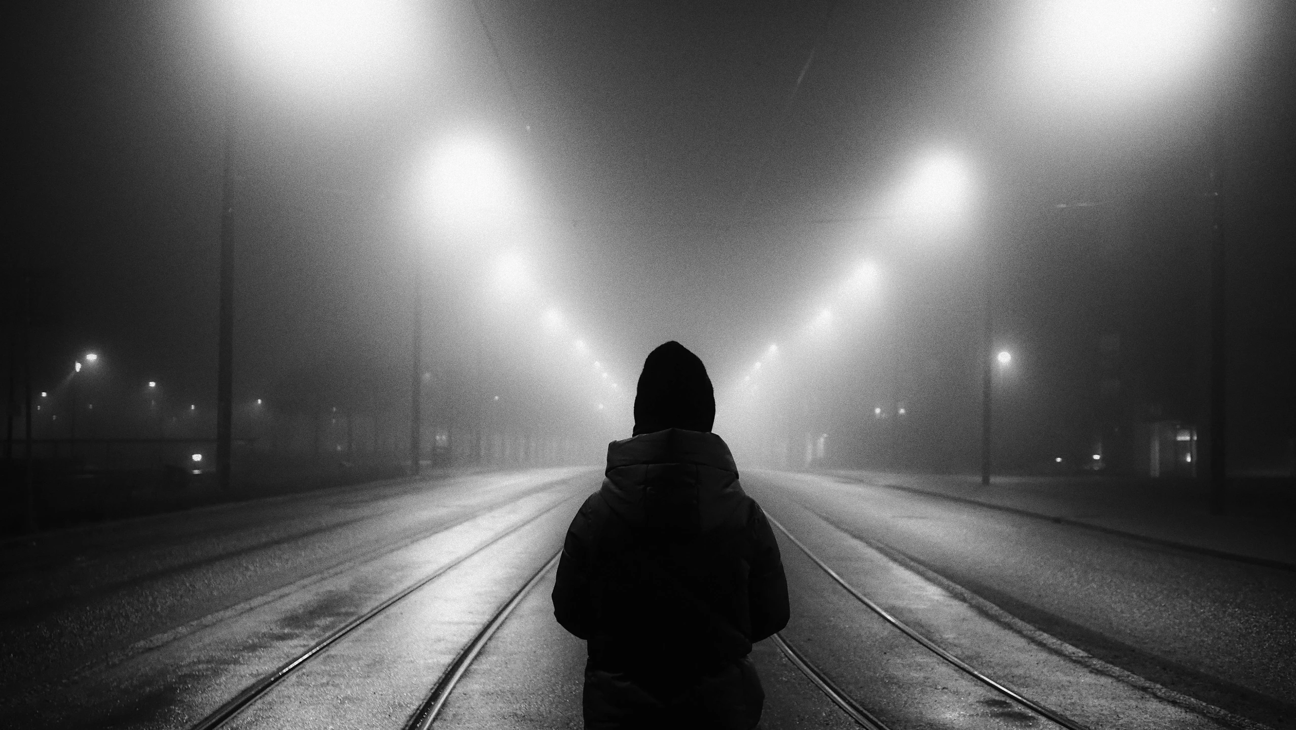 a person walking on a snowy city street