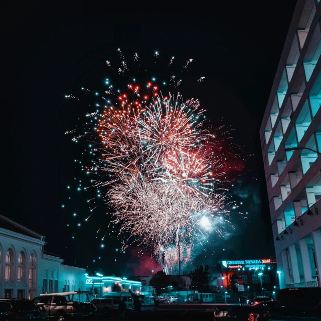 an event with fireworks being lit up the night sky