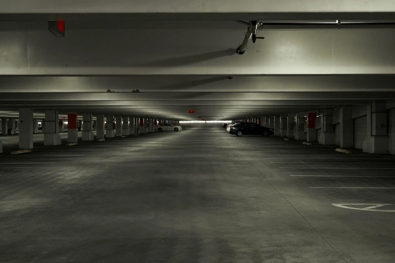 a dark parking garage has no people inside