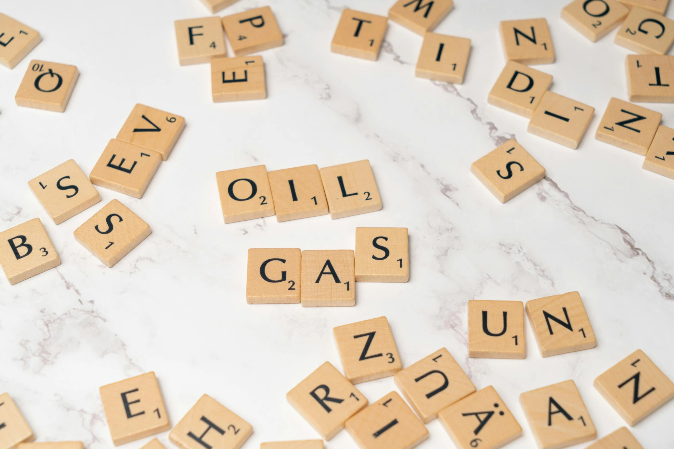 letters spelled out with scrabble on a marble surface