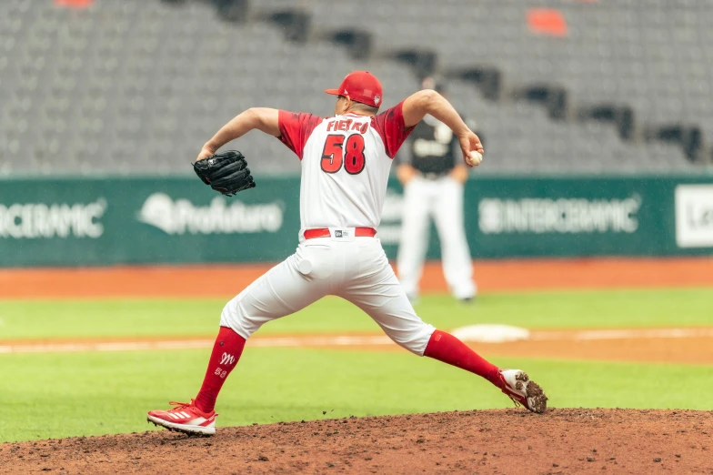 a pitcher on the mound for a baseball game