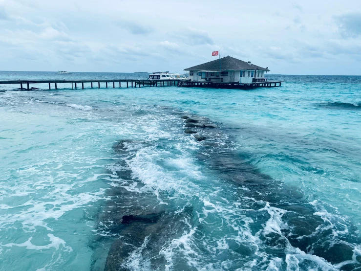 the water is really choppy near a pier