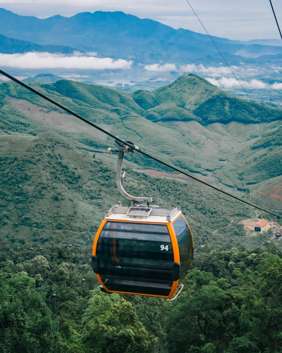 a cable car that is going up a mountain