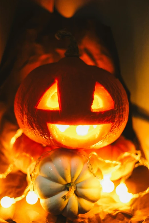 a lit jack o lantern pumpkin is on display