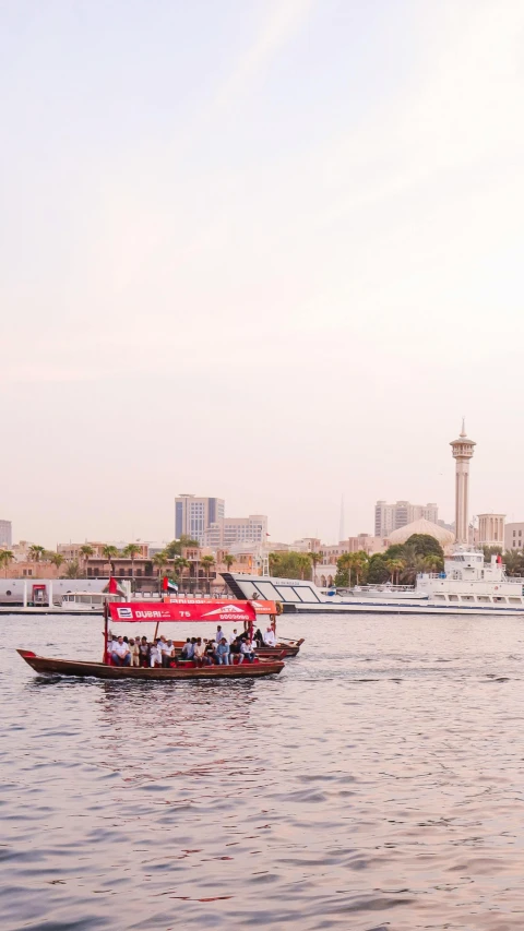 a boat on the water has people riding on it