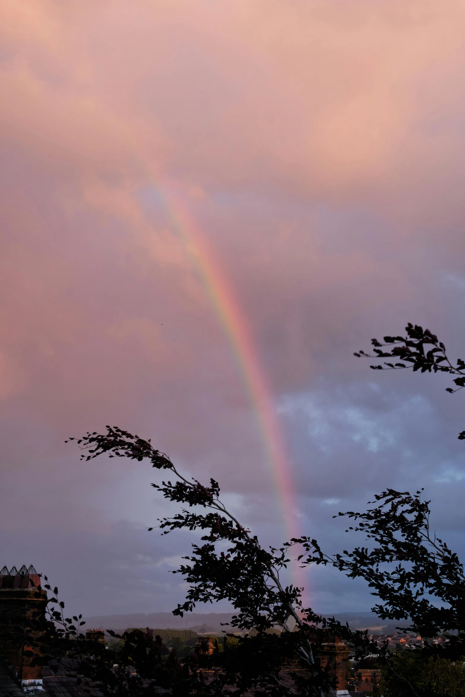 there are some clouds that have a rainbow in them