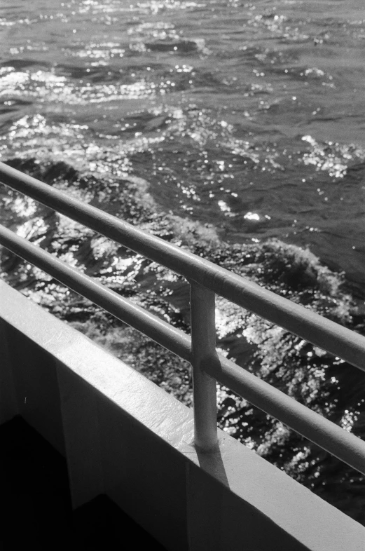 black and white pograph of water from a boat