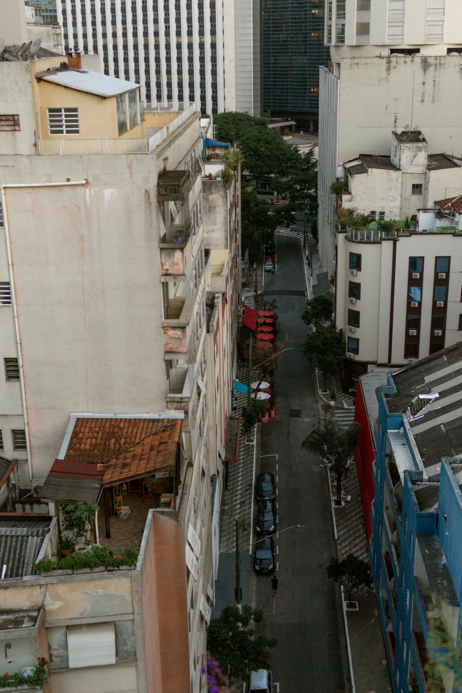 an aerial view of a street that has traffic in it