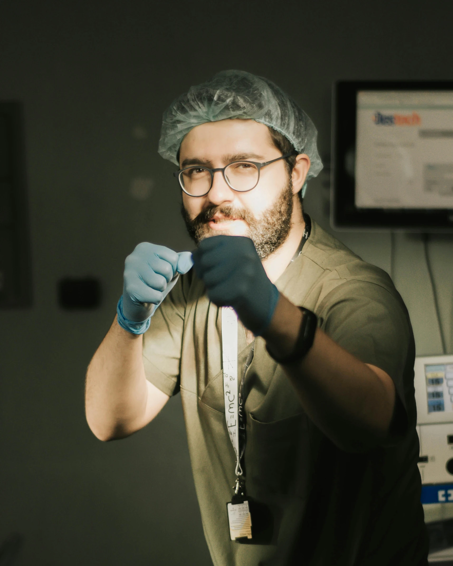 the man is standing in the operating room