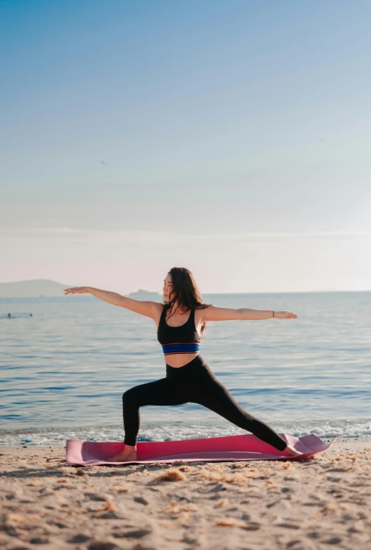 the woman is doing yoga poses on her surfboard
