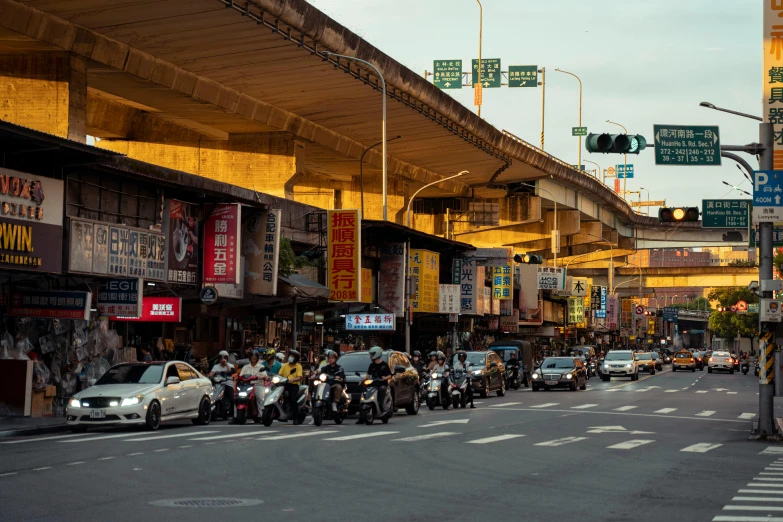 a city street is full of people and cars