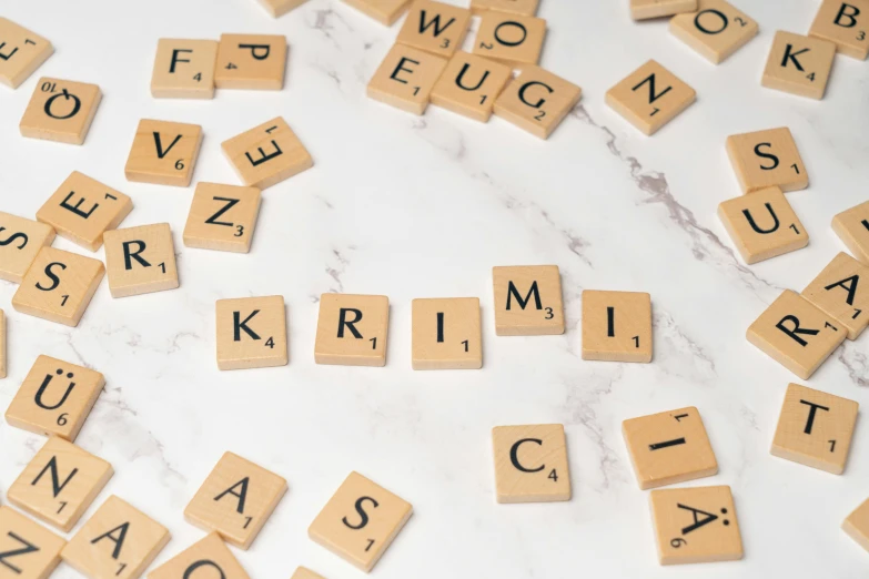 some type of scrabble with wooden letters on them