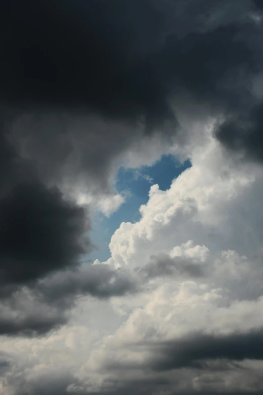 a dark grey cloud hovers in the distance