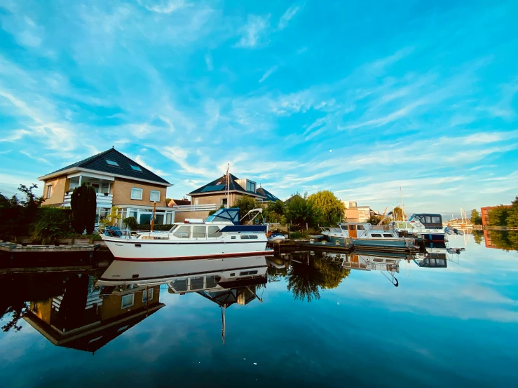 there are many boats docked on the water