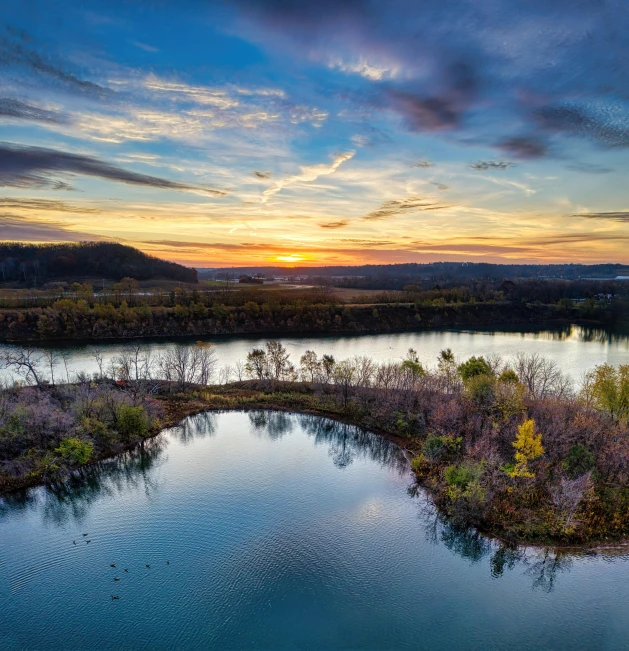 there is some kind of lake that can be seen at sunset