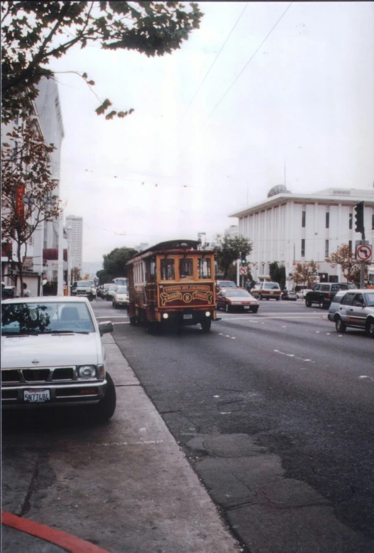 a bus driving on the road next to cars