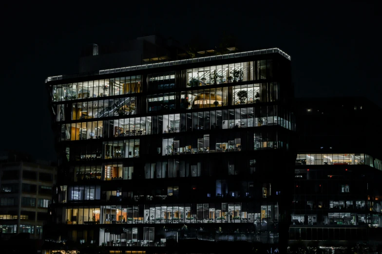 a building that has a lot of lit up windows