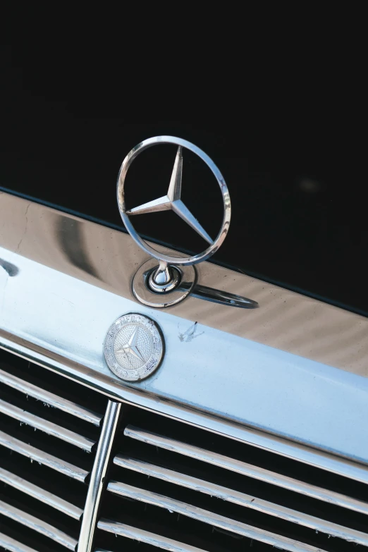 closeup of the front of a car with a logo on it