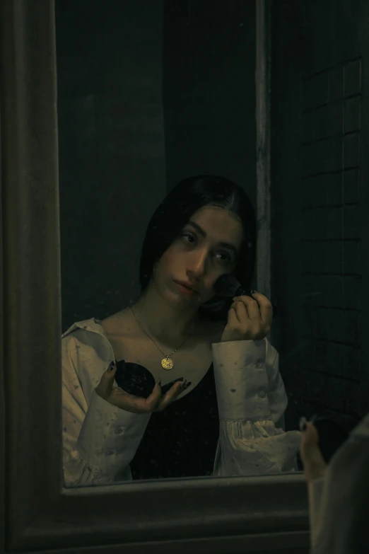 a woman is seen brushing her teeth in front of a mirror