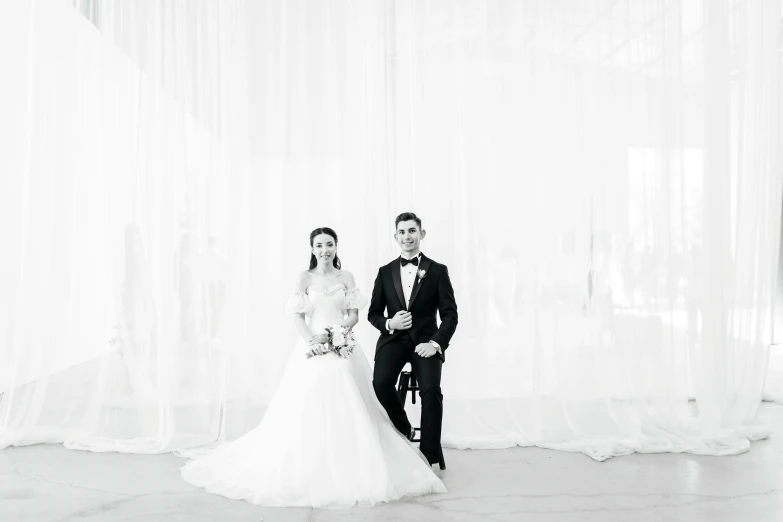 black and white po of a bride and groom