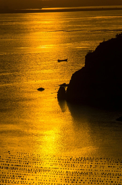 a lone boat is out in the ocean