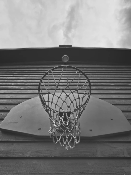 a basketball hoop attached to the side of a building