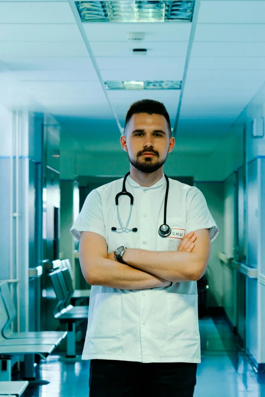 a medical worker standing in the hallway