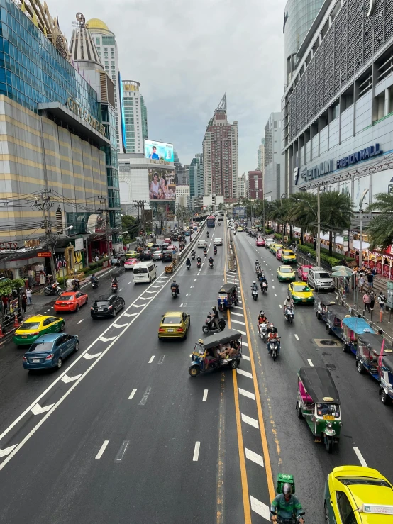 a traffic jam in an asian city with vehicles and taxis