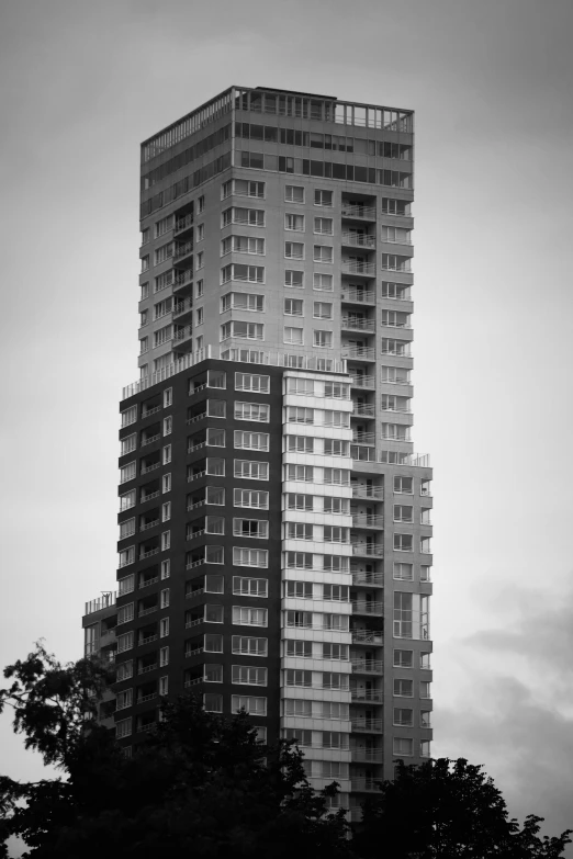 a large tall building sitting in the middle of the sky