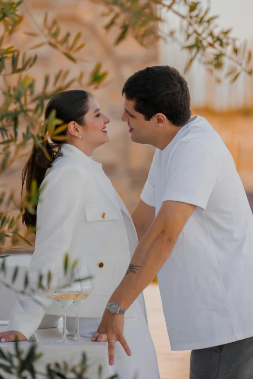 man and woman in white shirts with glasses