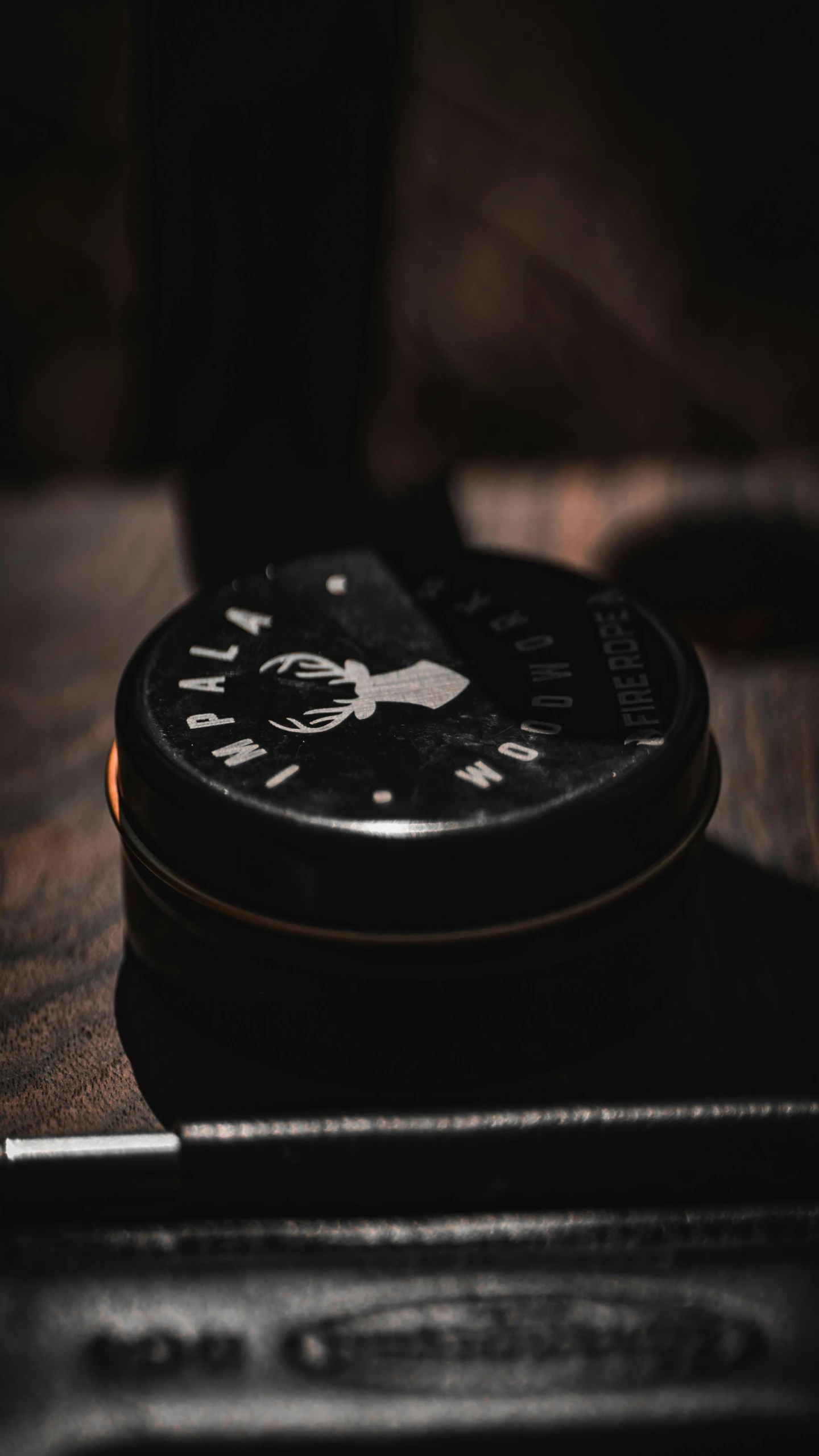 there is an old clock sitting on the desk