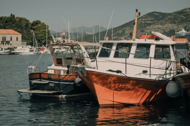 two ships that are docked in the water