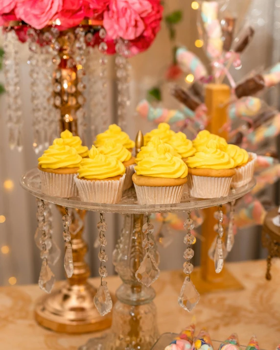 several cupcakes in different shades on a cake stand