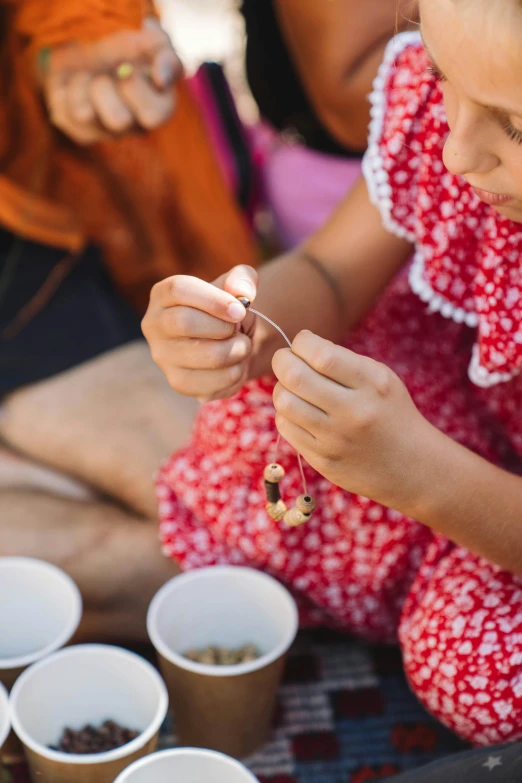 several people are preparing food for someone