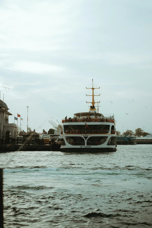 the large boat travels through the waters