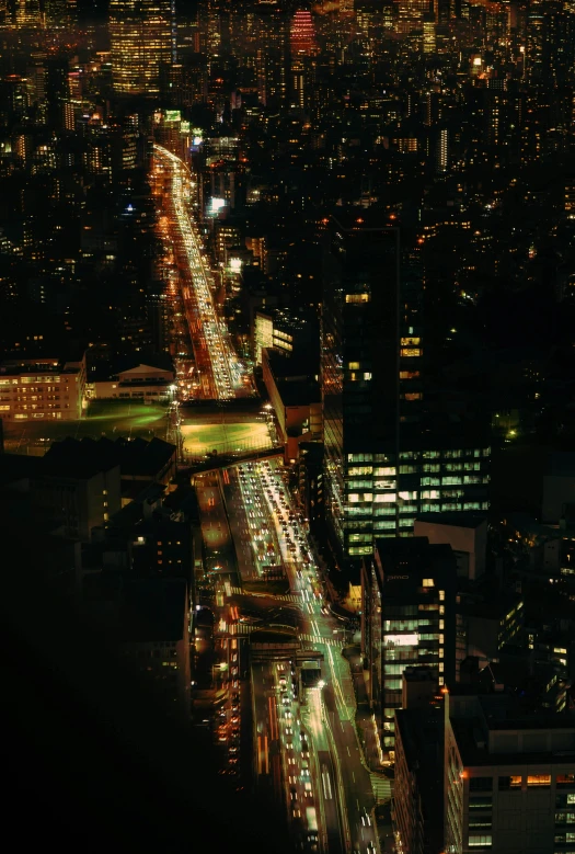 traffic on a freeway in a big city at night