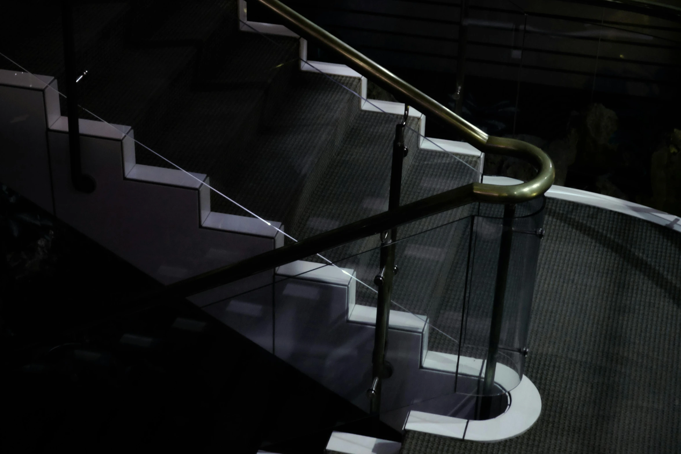 an artistic image of white handrails on a stair case