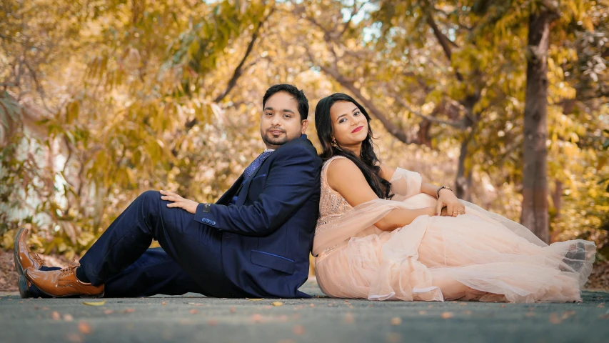 the newly couple poses for their wedding portraits