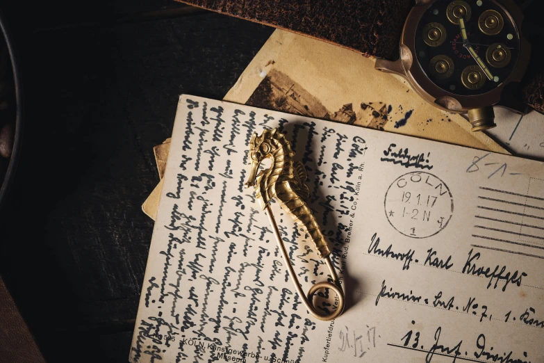 an antique telephone sitting on top of a note