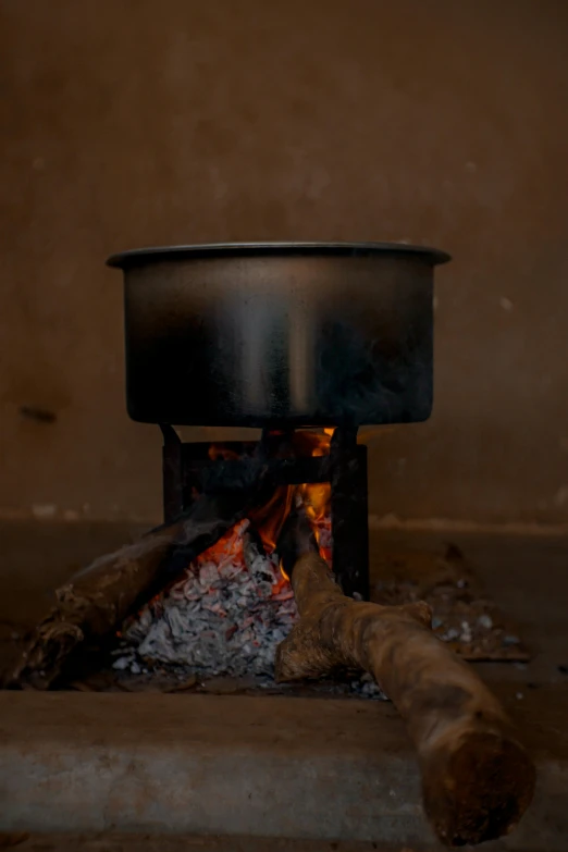 a person is placing soing in a pot