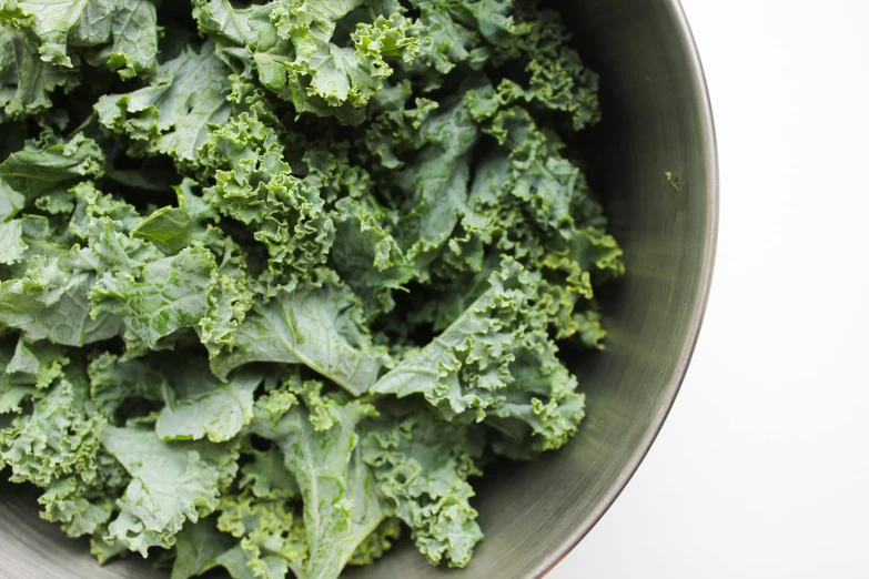 a close up of a bowl of vegetables