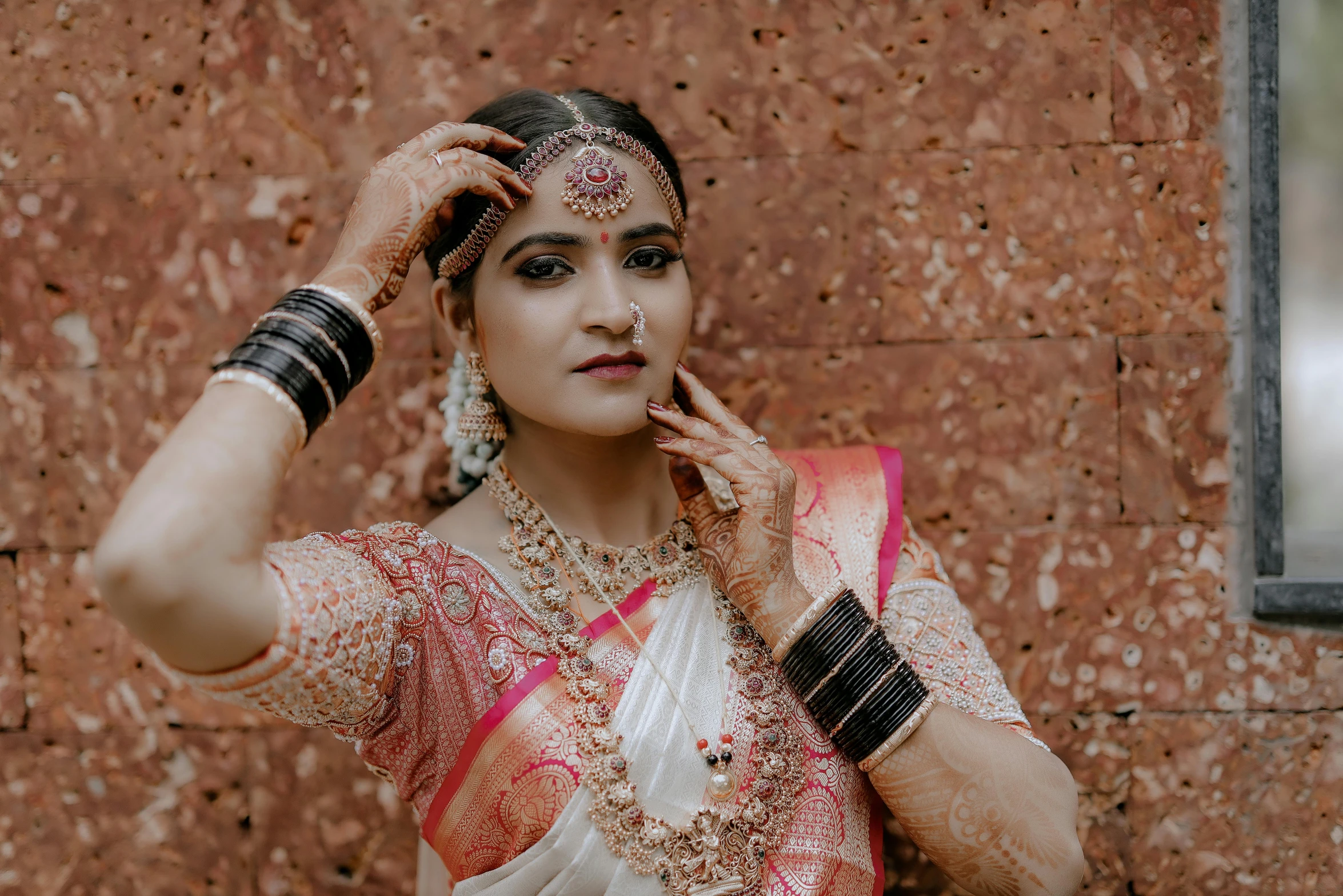a woman in a sari posing for a po