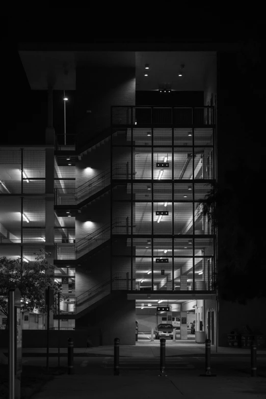 a lit up building lit up in the dark