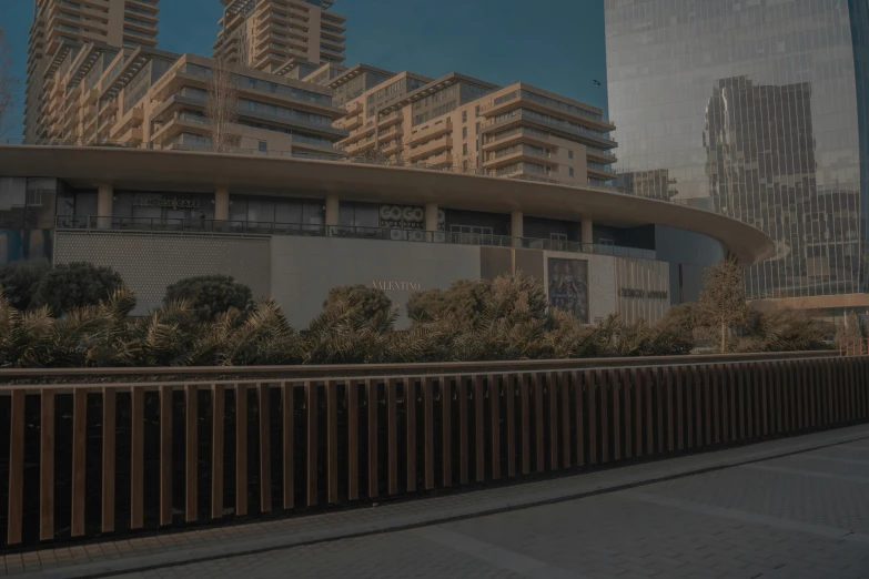 an unusual building and trees near it