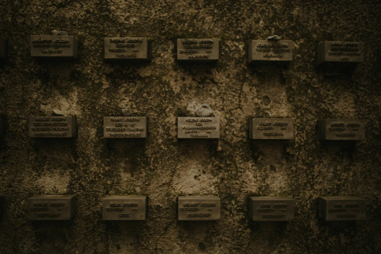 some boxes on a wall with writing on them