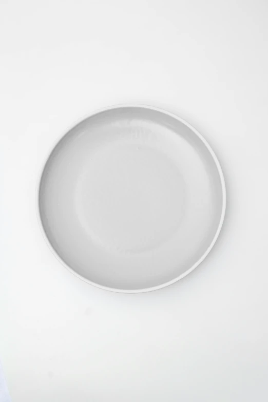 a white plate is sitting on a table